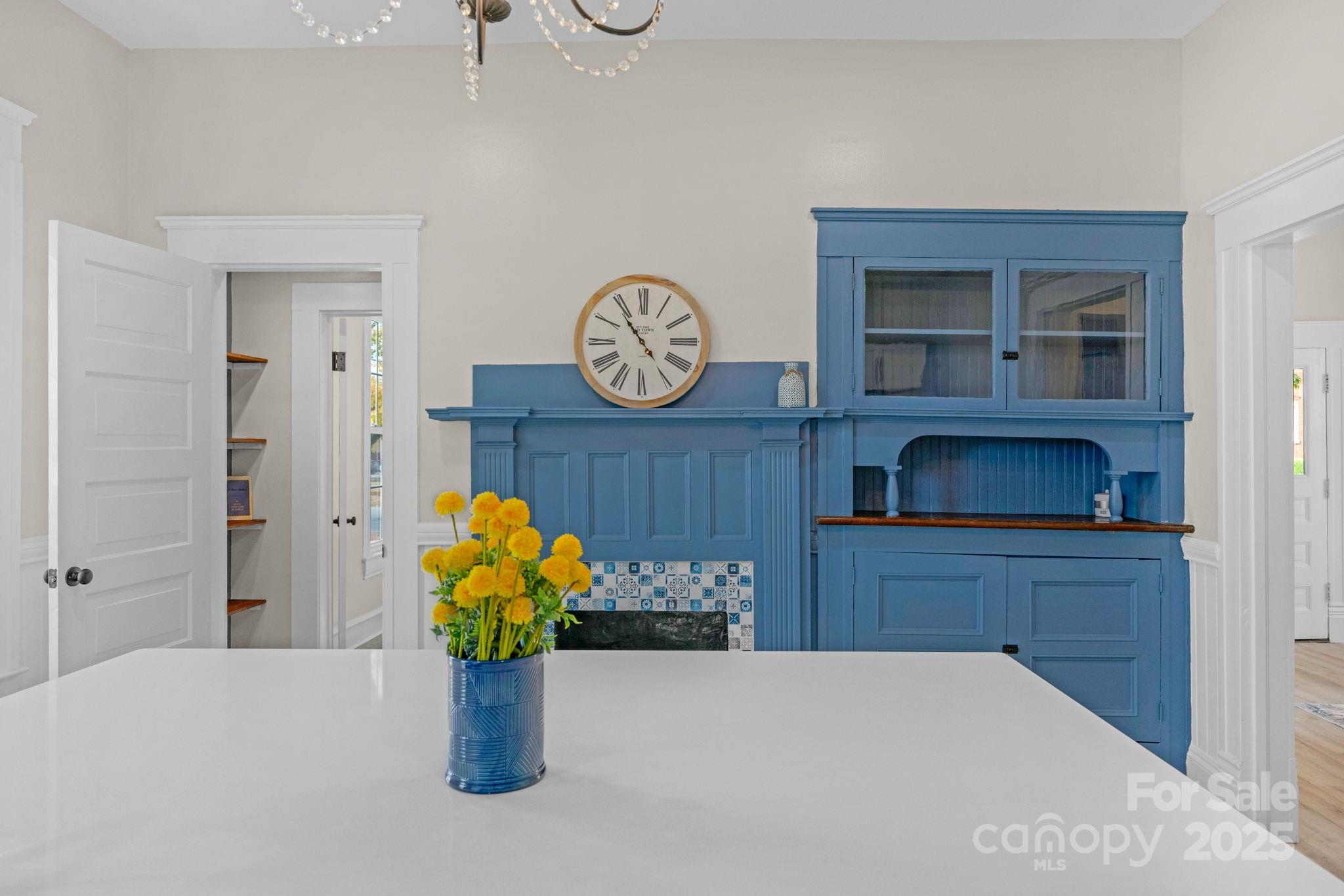 107 Rockingham Road Rockingham, NC 28379 - Photo 13 of 48 a room with a table chair and a potted plant