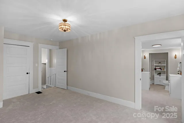a bathroom with a sink toilet tub and shower