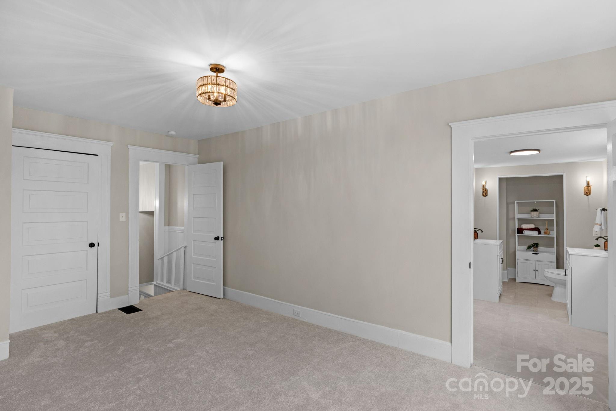 107 Rockingham Road Rockingham, NC 28379 - Photo 30 of 48 a view of a livingroom with a chandelier fan