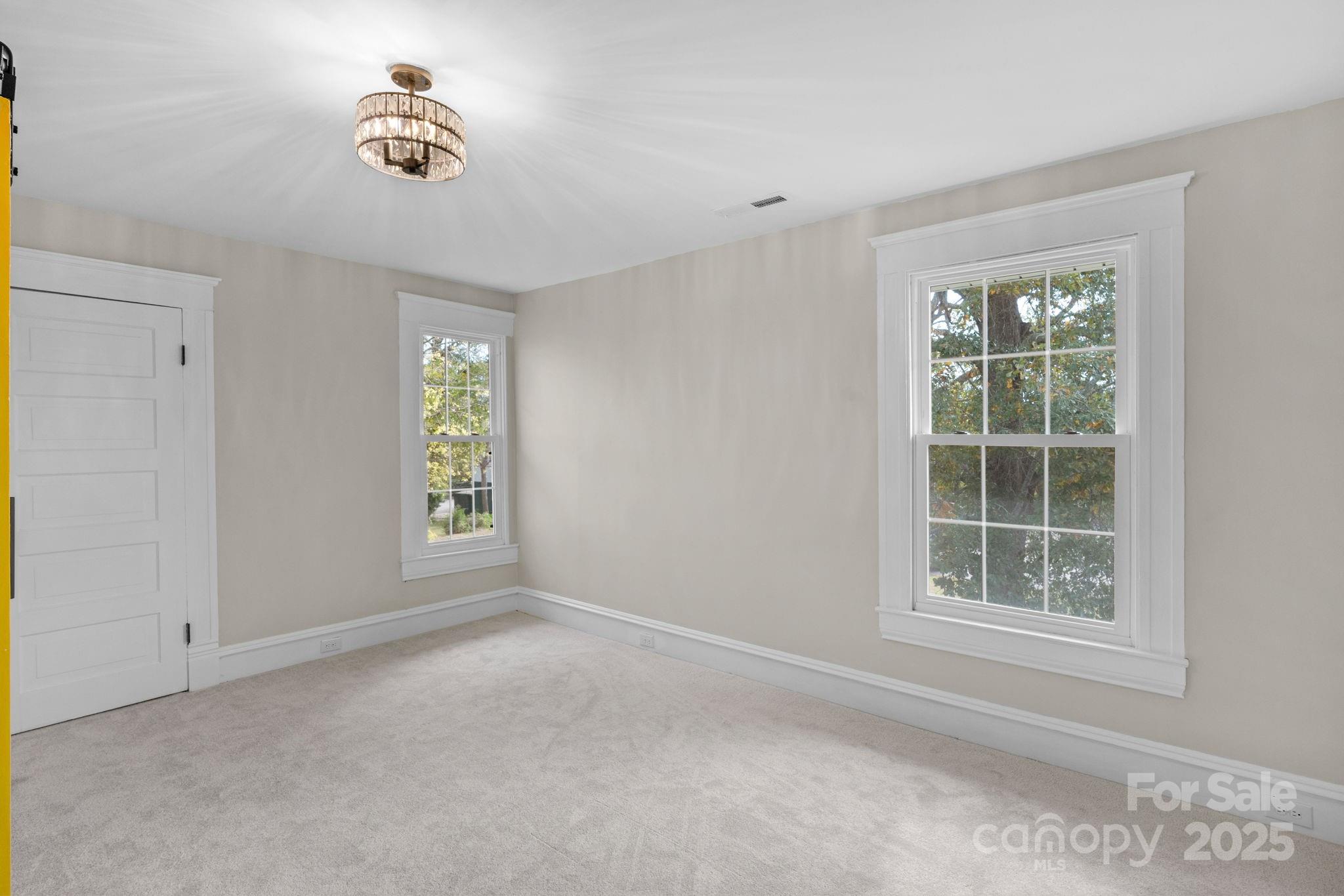 107 Rockingham Road Rockingham, NC 28379 - Photo 34 of 48 a view of an empty room with a window