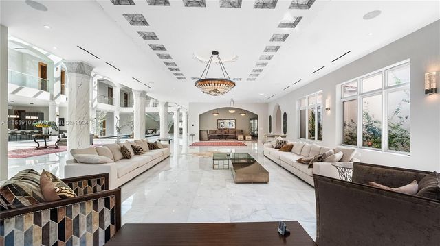 a view of entryway and hall with dining area