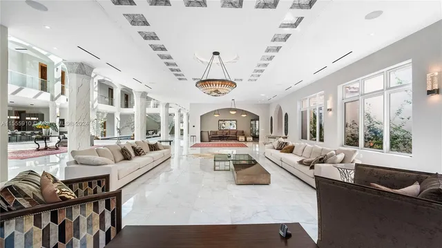 a view of entryway and hall with dining area