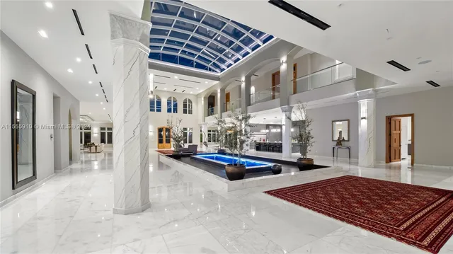 a view of a yard with palm trees