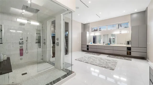 a view of swimming pool with sitting area