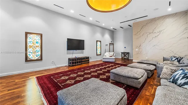 a view of a chairs and table in a patio