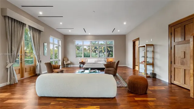 a very nice looking yard with a large tree