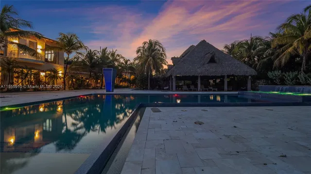 a kitchen with stainless steel appliances granite countertop a stove and a refrigerator