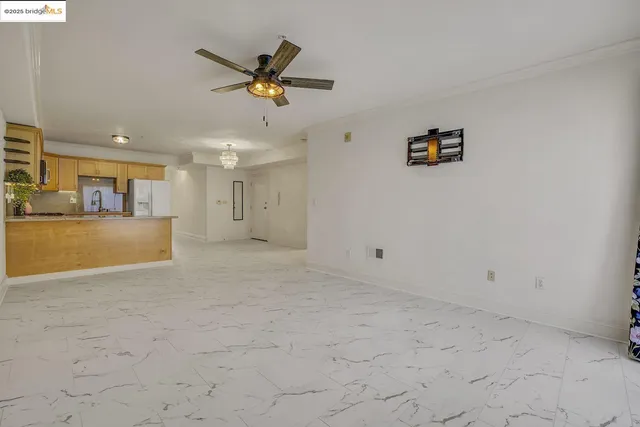 a kitchen with a stove a sink and a microwave