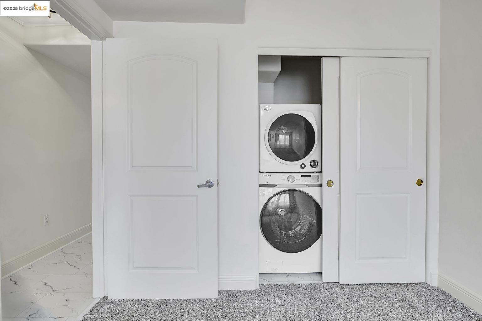 1515 14th Avenue, Unit 302 Oakland, CA 94606 - Photo 24 of 32 a utility room with dryer and washer