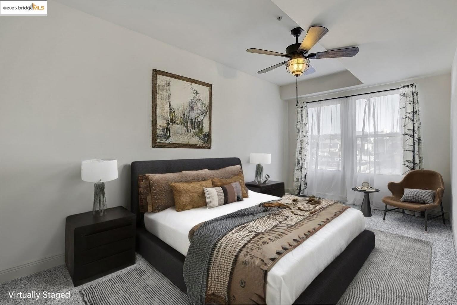 1515 14th Avenue, Unit 302 Oakland, CA 94606 - Photo 7 of 32 a bedroom with a bed couch and window