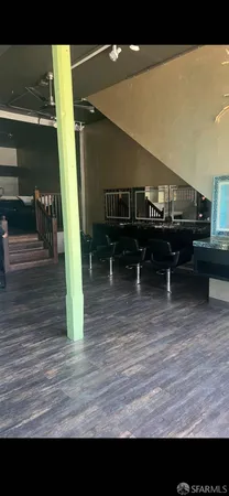 a living room with wooden floor