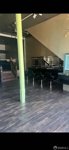 a living room with wooden floor