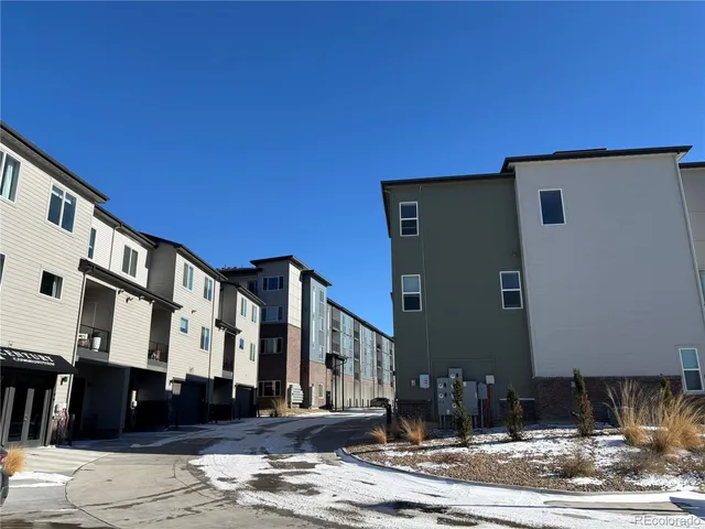 a front view of a building with street view