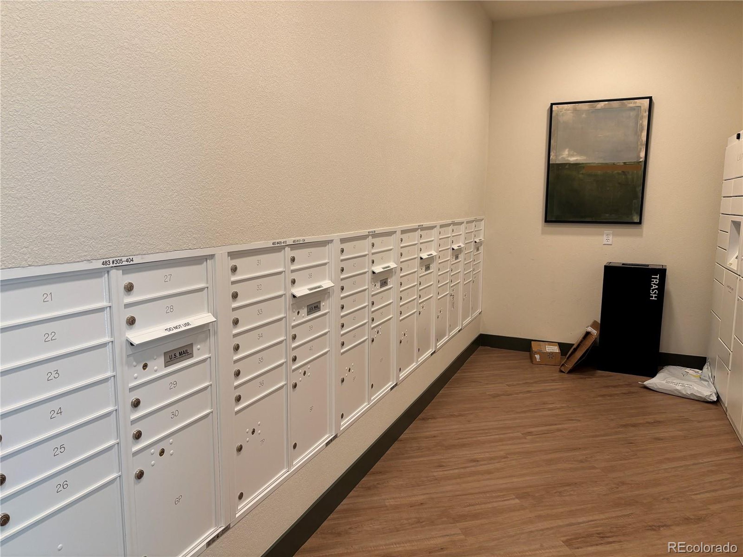 437 Interlocken Boulevard, Unit 102 Broomfield, CO 80021 - Photo 27 of 27 a view of a livingroom with the wooden cabinet