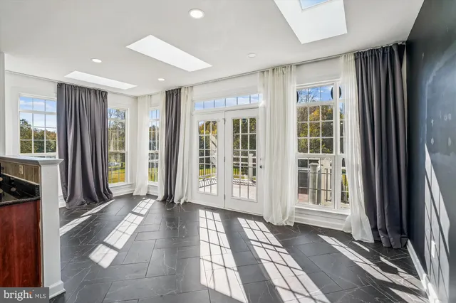 a picture of a bathroom with a shower