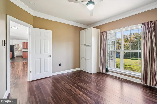 a bathroom with a tub and a window
