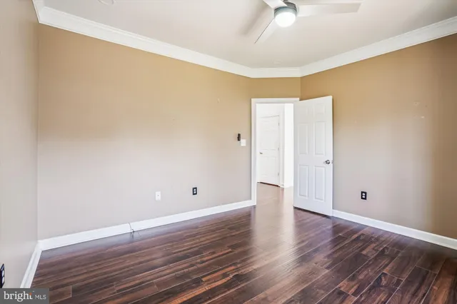 a bathroom with a tub sink and a mirror