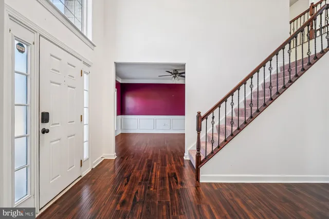 a view of entryway with wooden floor