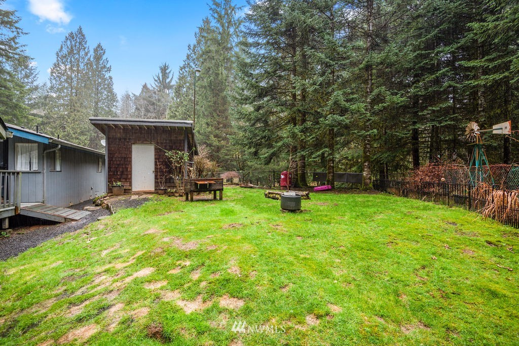 664 Mill Creek Road Longview, WA 98632 - Photo 21 of 22 a view of a backyard with sitting area