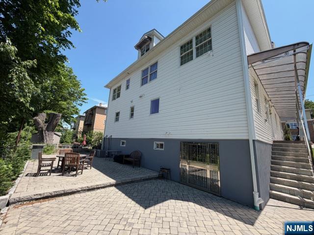 177 Maple Street Fairview, NJ 07022 - Photo 20 of 24 a front view of a house with sitting area