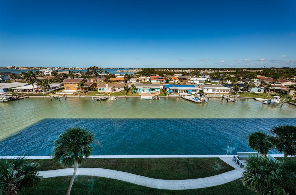 4725 Cove Circle, Unit 604 St. Petersburg, FL 33708 - Photo 16 of 53 an aerial view of residential houses with outdoor space