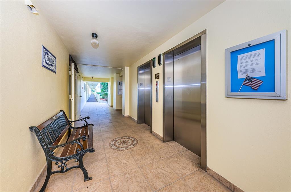 4725 Cove Circle, Unit 604 St. Petersburg, FL 33708 - Photo 37 of 53 a view of a livingroom with furniture and windows