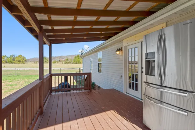 a view of a yard with an outdoor space