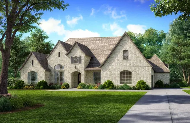 a view of a white house with garden