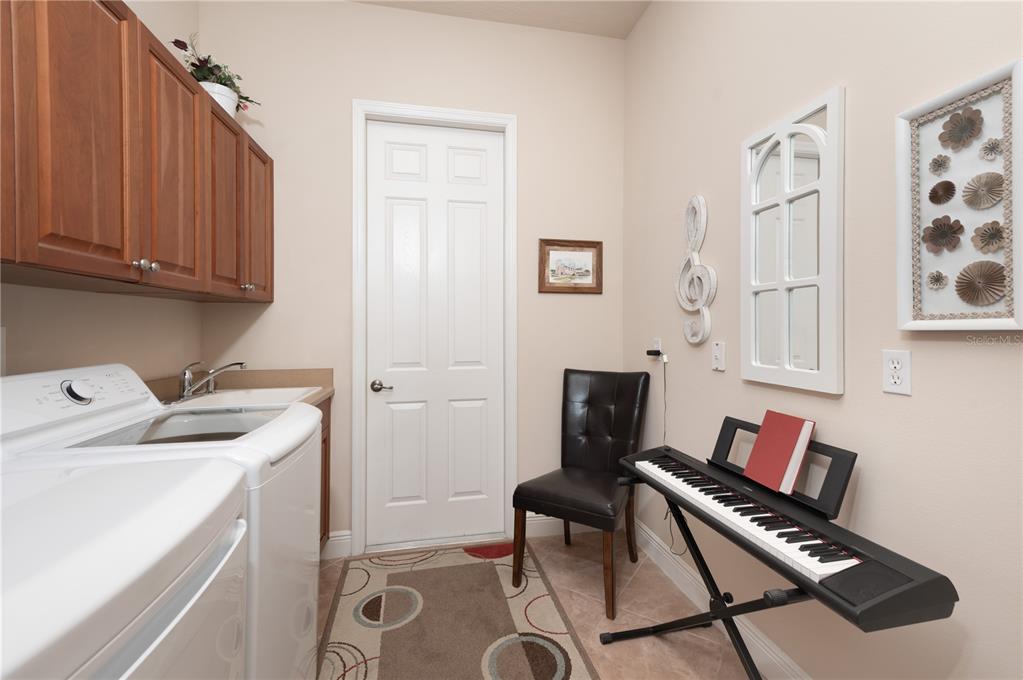 202 Lourdan Court DeBary, FL 32713 - Photo 17 of 38 a room with storage and utility