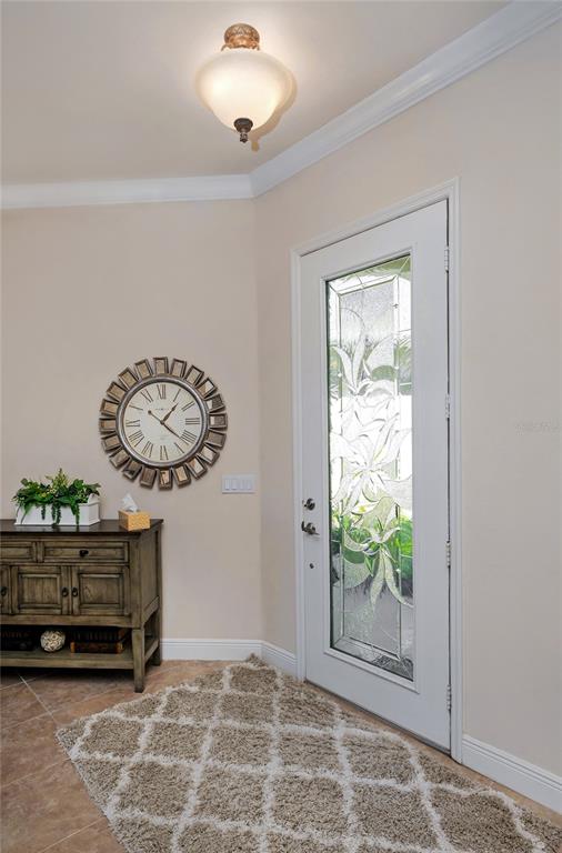 202 Lourdan Court DeBary, FL 32713 - Photo 7 of 38 a view of a room with gym equipment