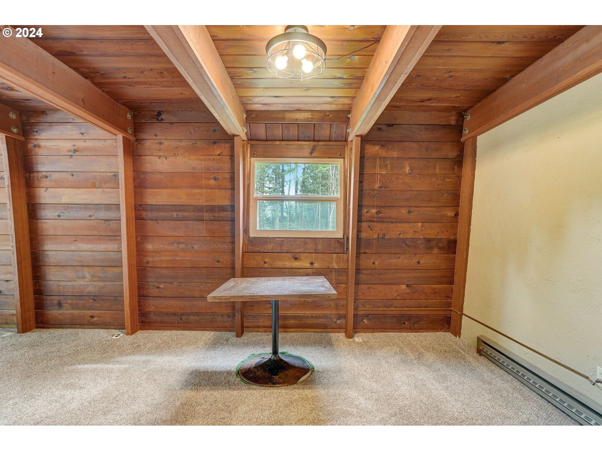 2162 East Loop Road Stevenson, WA 98648 - Photo 17 of 48 a room that has a window and a wooden door
