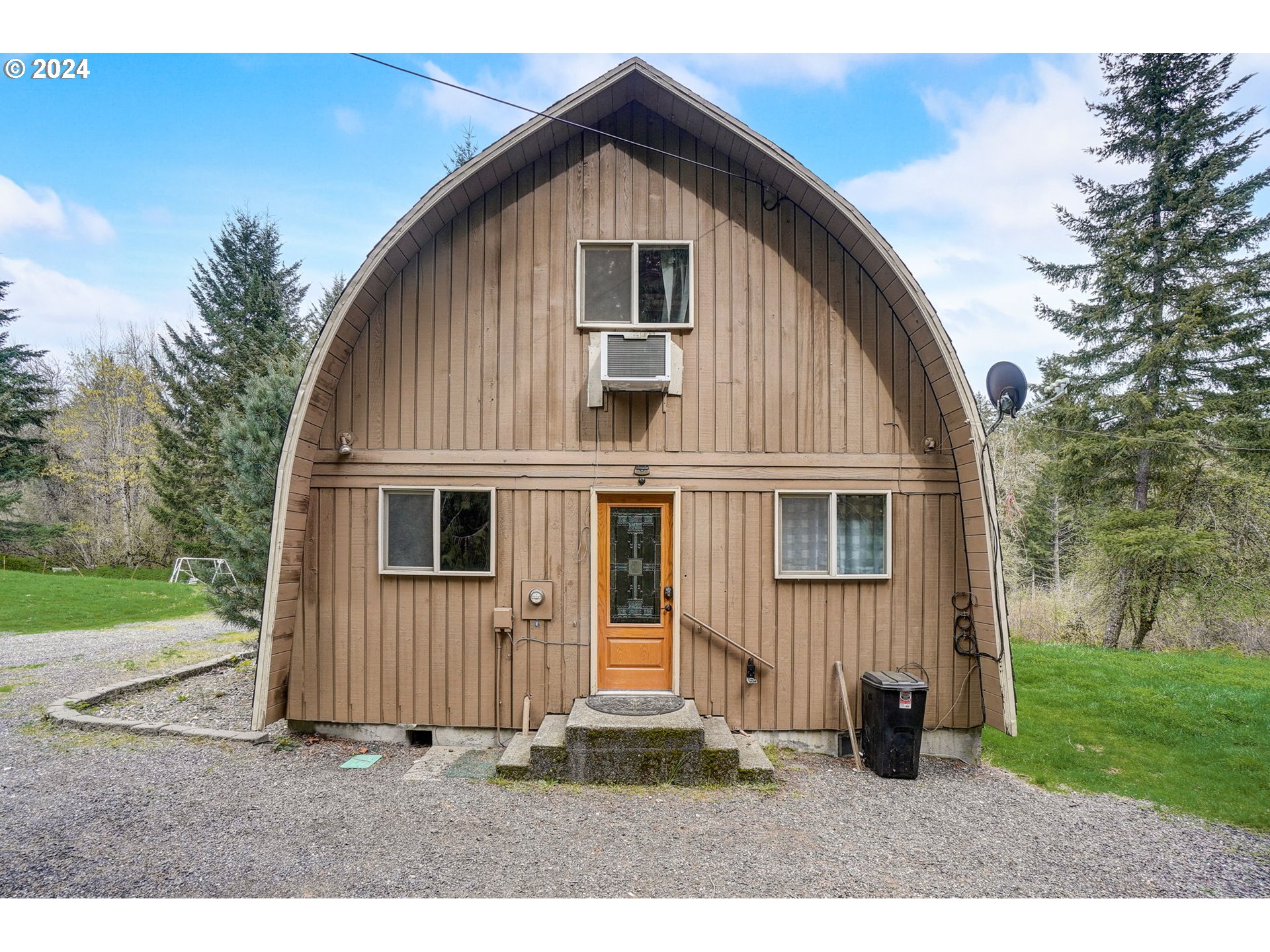 2162 East Loop Road Stevenson, WA 98648 - Photo 2 of 48 a front view of a house with a yard