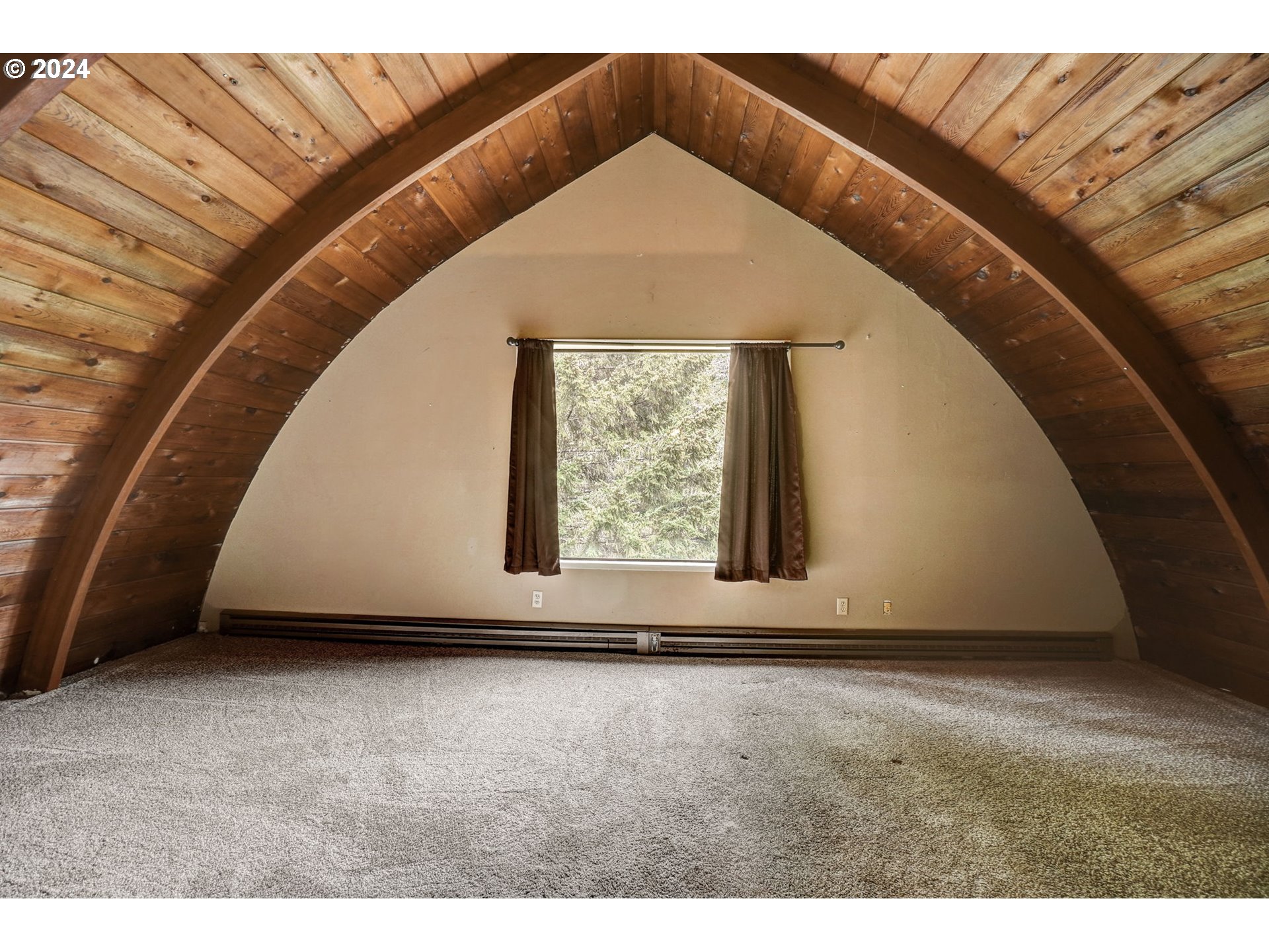 2162 East Loop Road Stevenson, WA 98648 - Photo 23 of 48 a view of an empty room with wooden floor