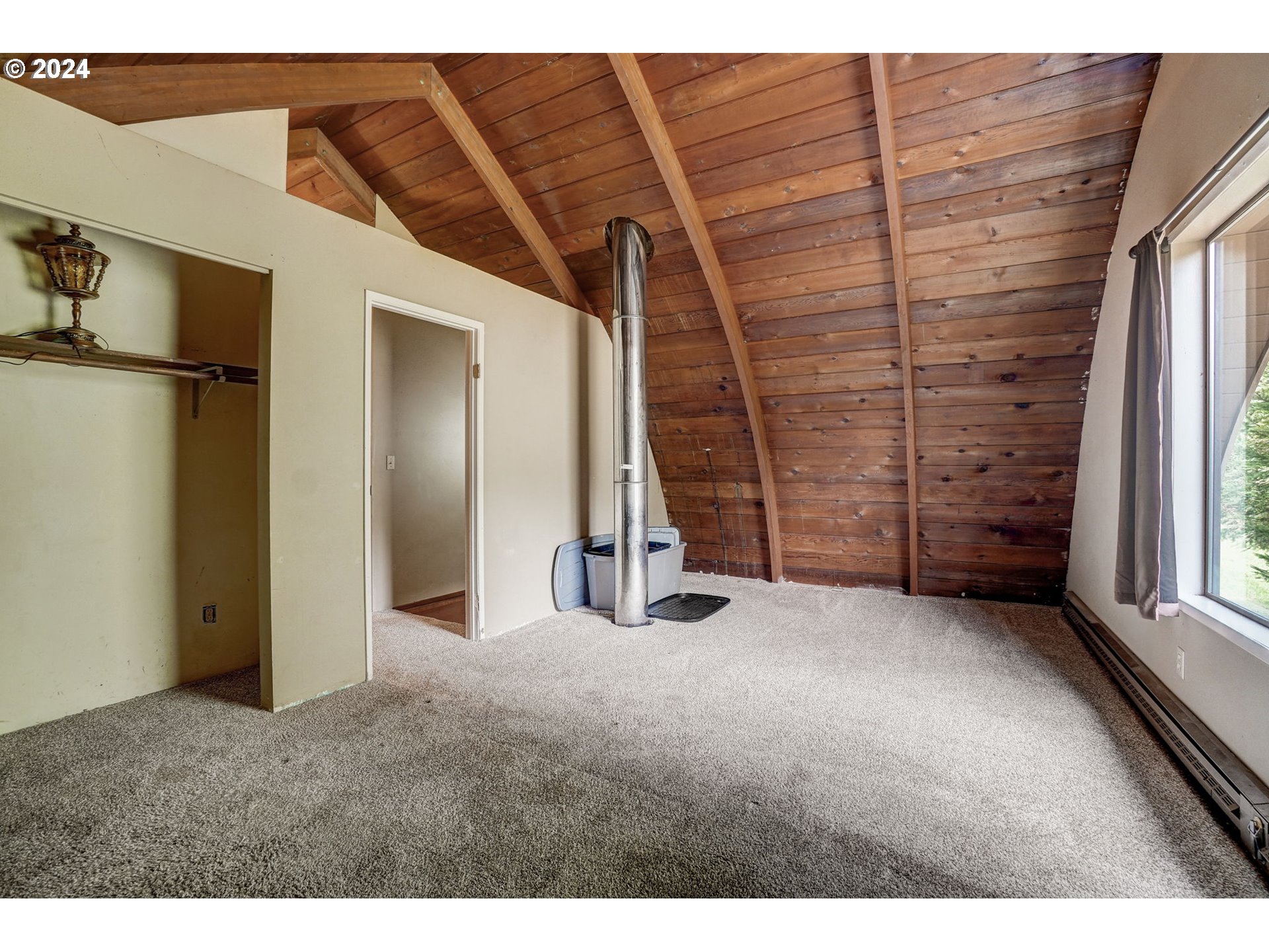 2162 East Loop Road Stevenson, WA 98648 - Photo 25 of 48 a view of an empty room with a fireplace