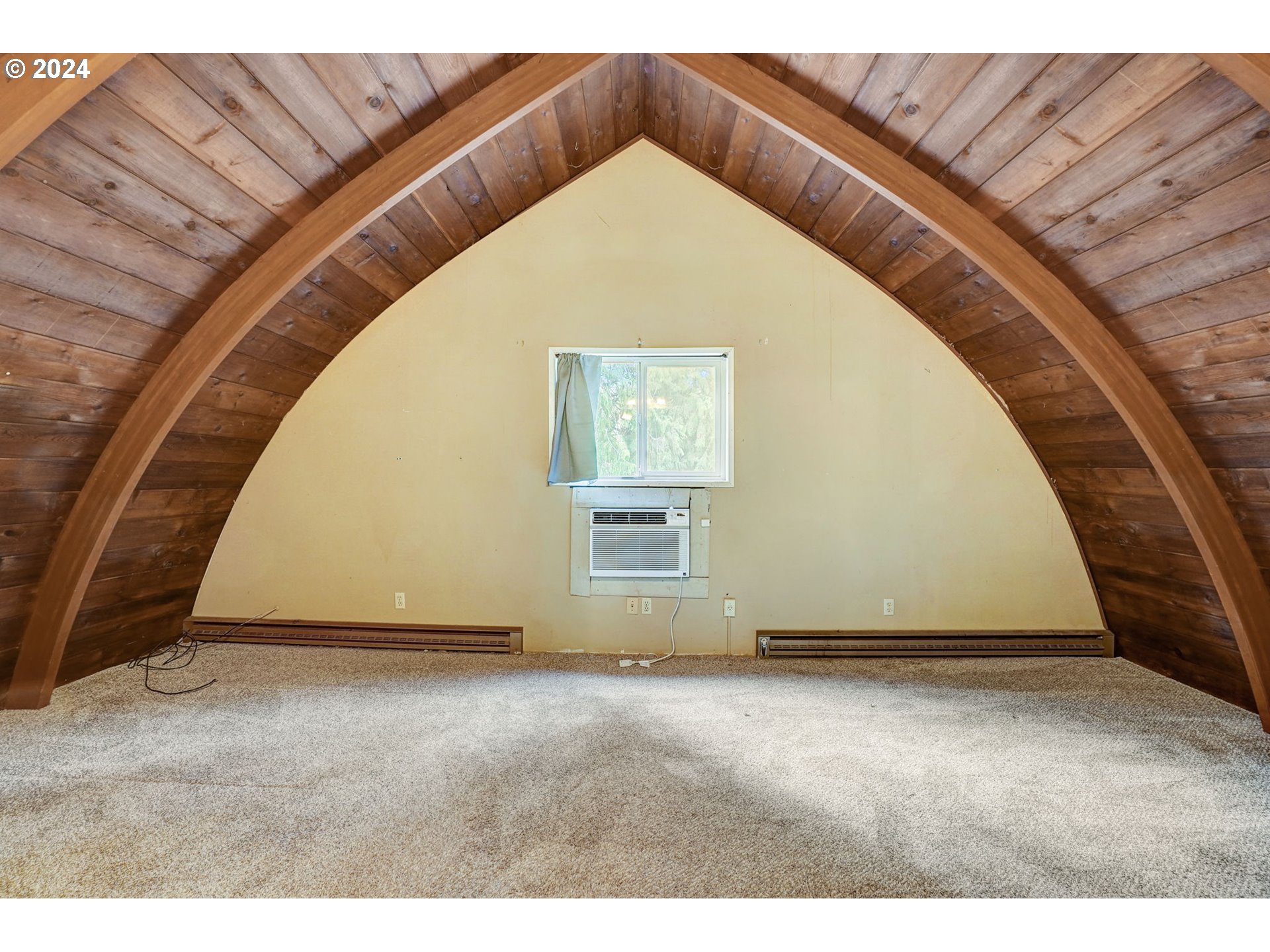 2162 East Loop Road Stevenson, WA 98648 - Photo 30 of 48 a view of an empty room with wooden floor