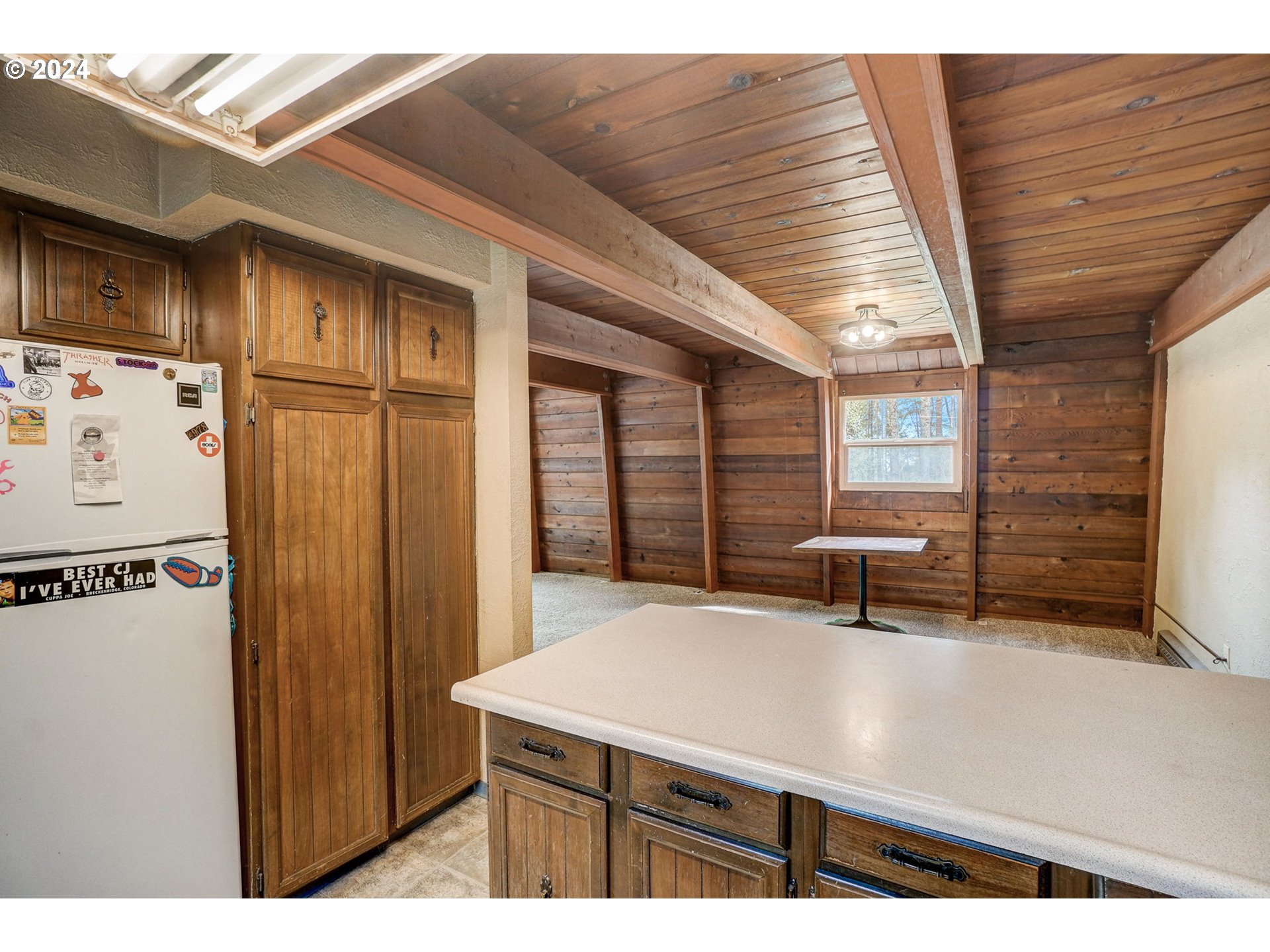 2162 East Loop Road Stevenson, WA 98648 - Photo 10 of 48 a kitchen with stainless steel appliances refrigerator stove and table