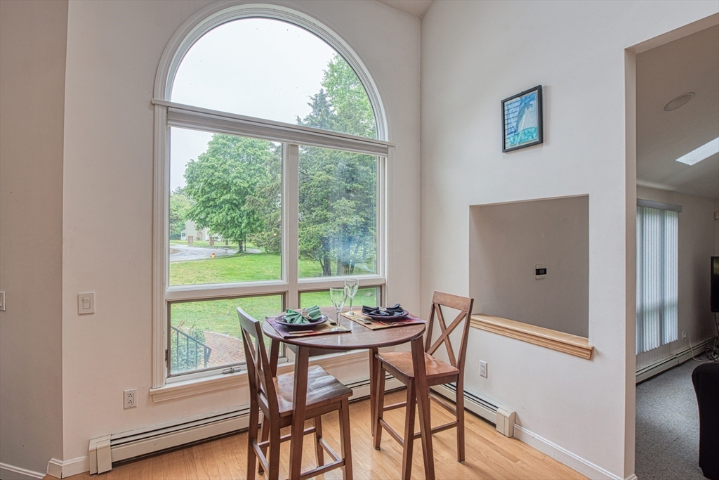 7 Tisdale Road Sharon, MA 02067 - Photo 4 of 37 a view of a dining room with furniture window and wooden floor