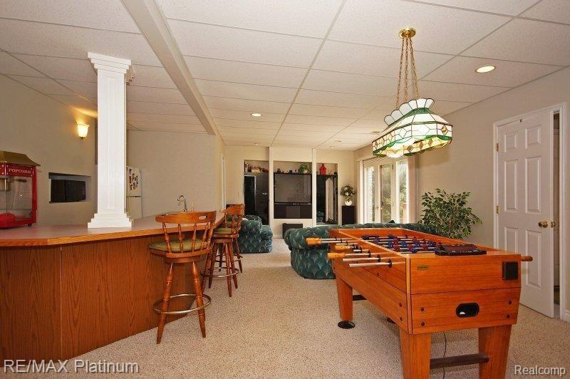 8619 Webster Hills Road Dexter, MI 48130 - Photo 19 of 25 LL Rec Rm-Big Screen Included!