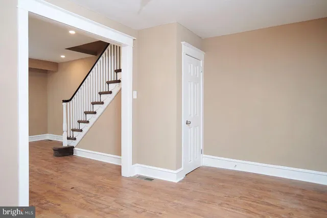 a view of entryway with wooden floor