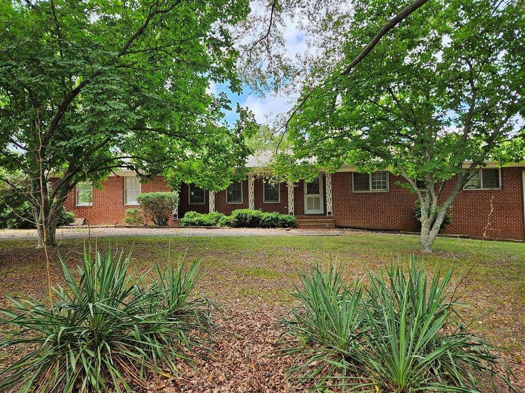 1236 Temple Road East Bremen, GA 30110 - Photo 1 of 1 a front view of a house with garden