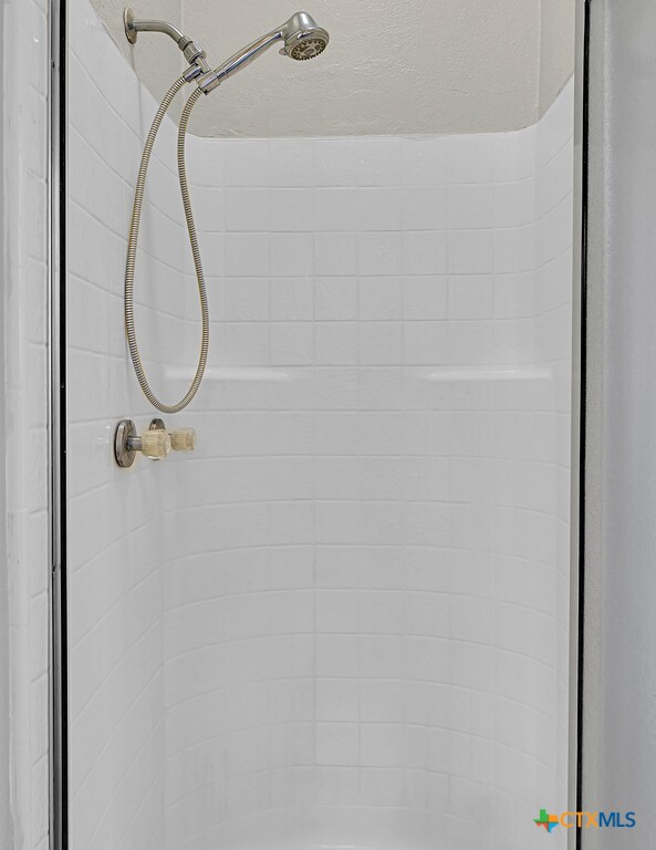 3900 Fox Ridge Road Lorena, TX 76655 - Photo 18 of 35 a bathroom with a shower