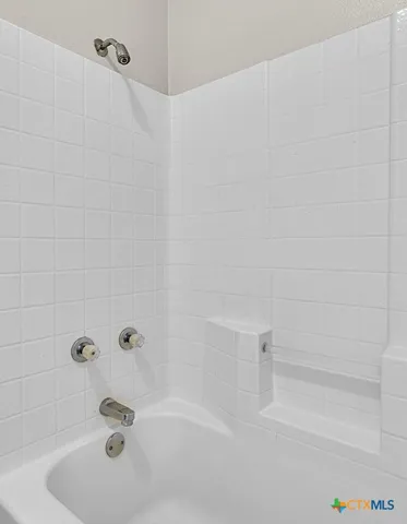 a bathroom with a bathtub