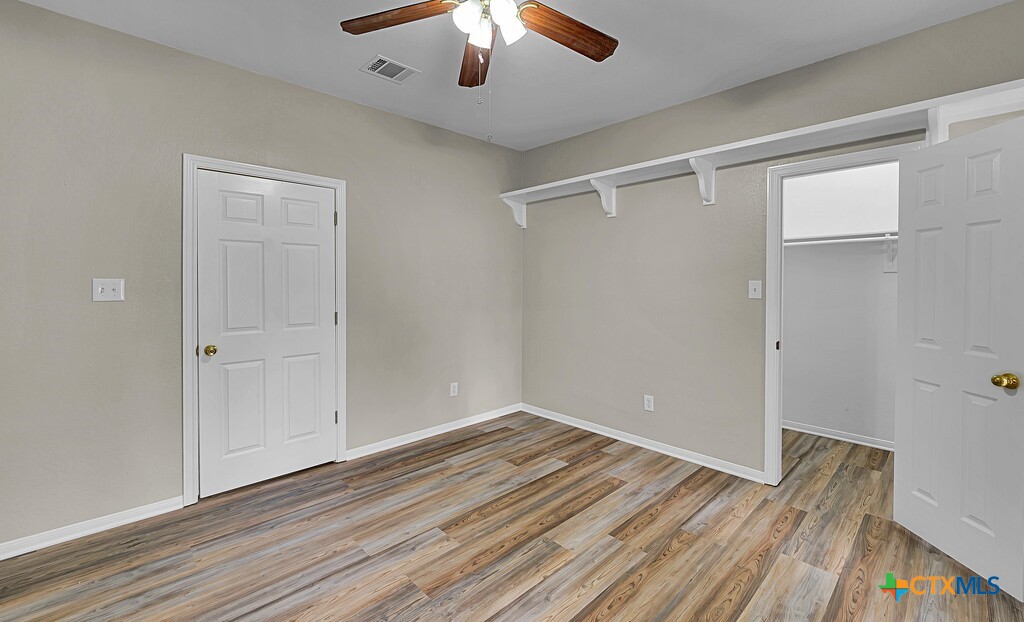 3900 Fox Ridge Road Lorena, TX 76655 - Photo 24 of 35 wooden floor in an empty room
