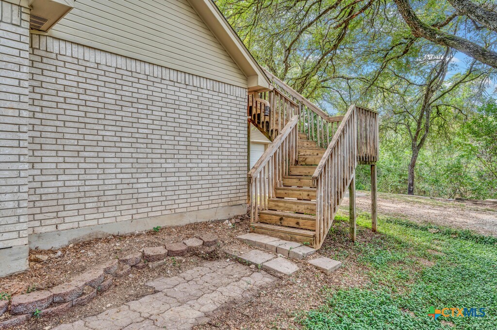3900 Fox Ridge Road Lorena, TX 76655 - Photo 25 of 35 a backyard of a house with lots of green space