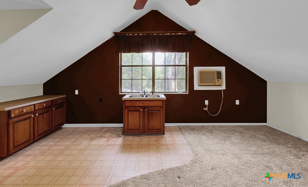 3900 Fox Ridge Road Lorena, TX 76655 - Photo 27 of 35 a kitchen with a refrigerator and a stove