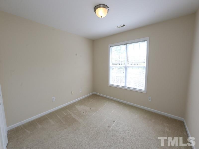 2715 Andover Glen Road Raleigh, NC 27604 - Photo 11 of 16 an empty room with a window
