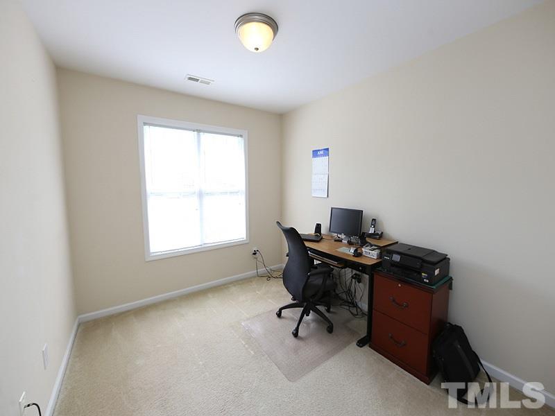 2715 Andover Glen Road Raleigh, NC 27604 - Photo 13 of 16 a view of a workspace with a window