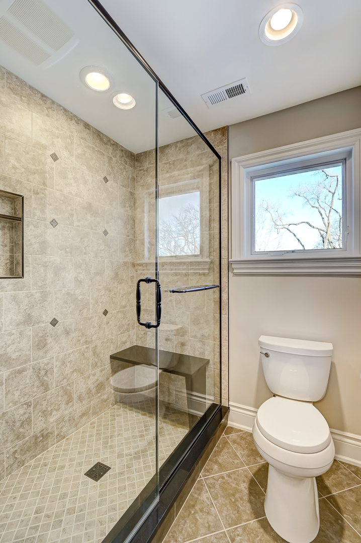 359 Ruby Street Clarendon Hills, IL 60514 - Photo 31 of 45 a bathroom with a toilet and a shower
