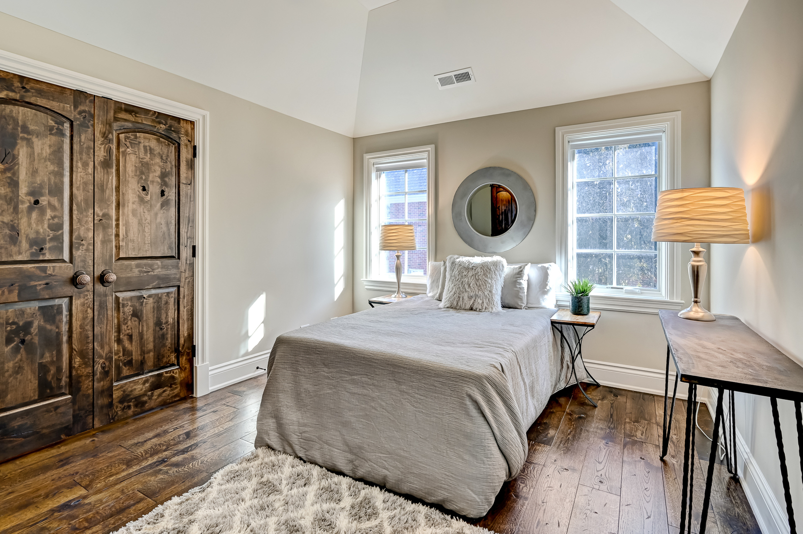 359 Ruby Street Clarendon Hills, IL 60514 - Photo 32 of 45 a bedroom with a bed and a lamp on dresser