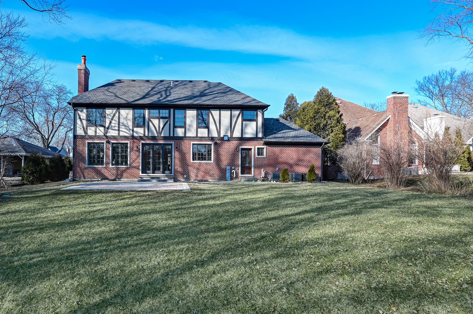 359 Ruby Street Clarendon Hills, IL 60514 - Photo 41 of 45 a front view of a house with a garden